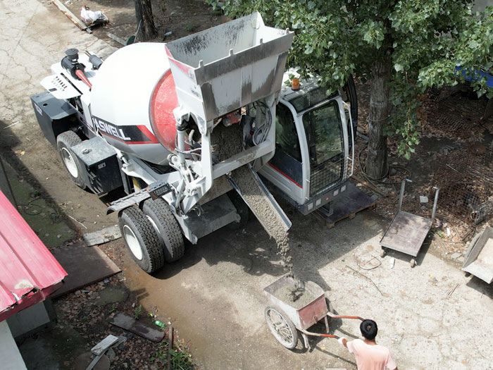 self loading concrete mixer works